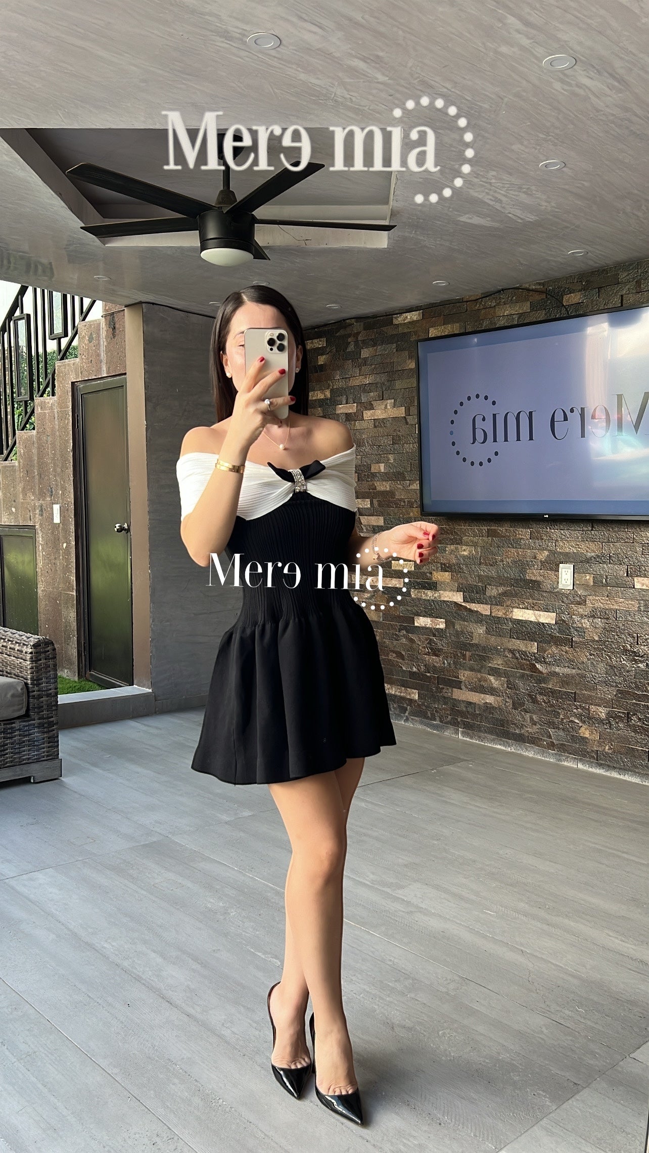 Vestido negro blanco moño