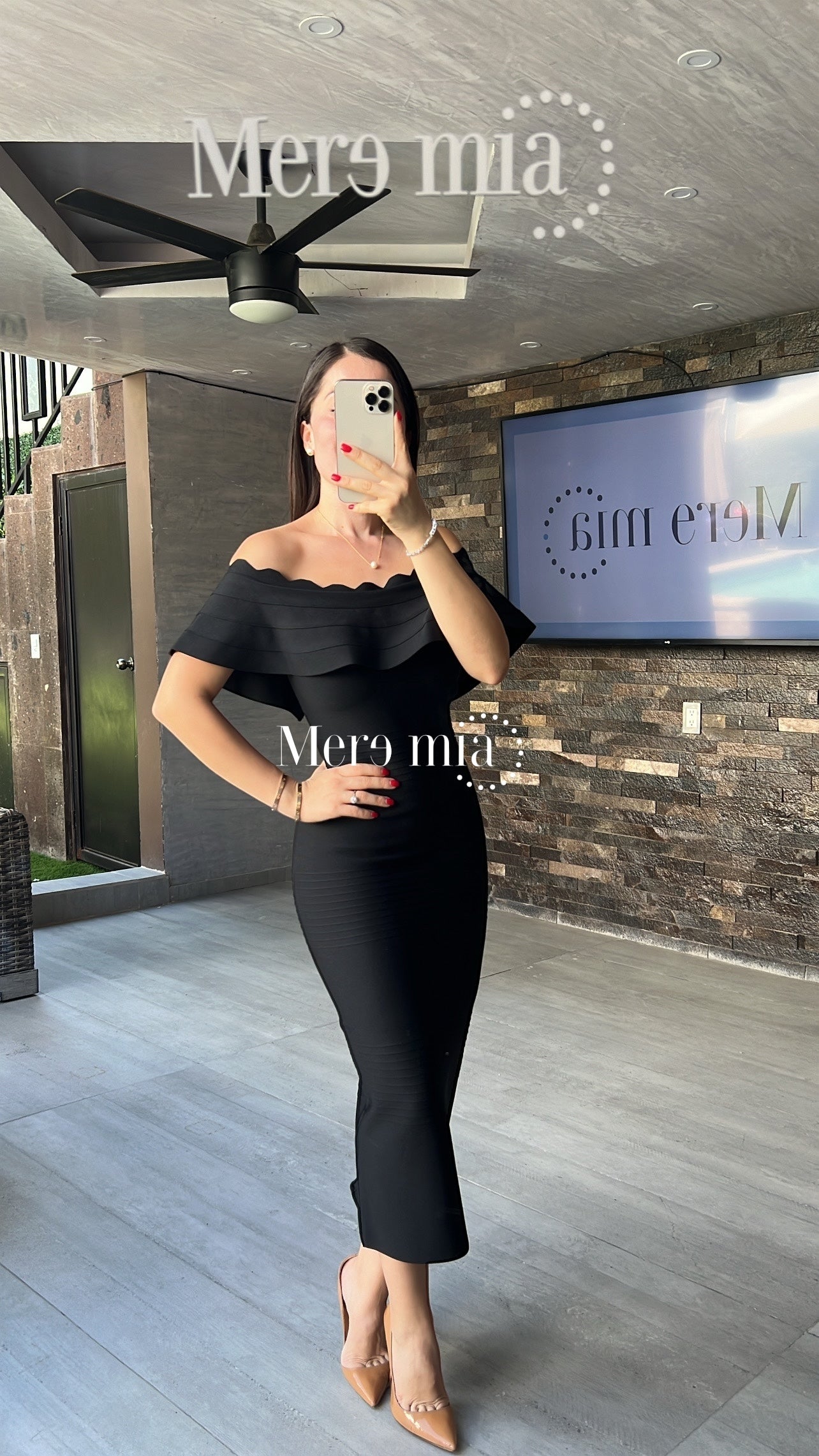 Vestido negro olan arriba