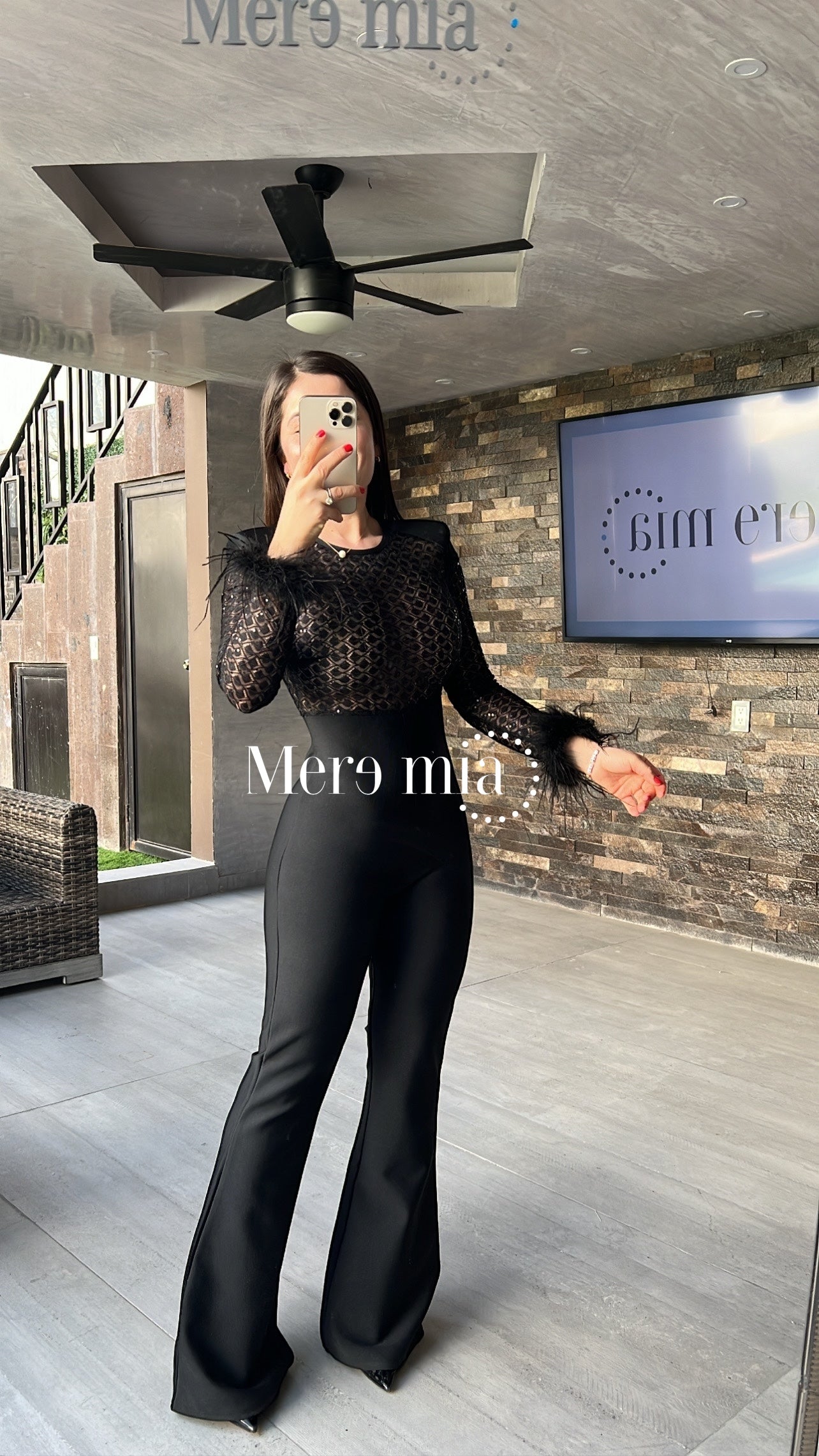 Jumpsuit negro plumas mangas