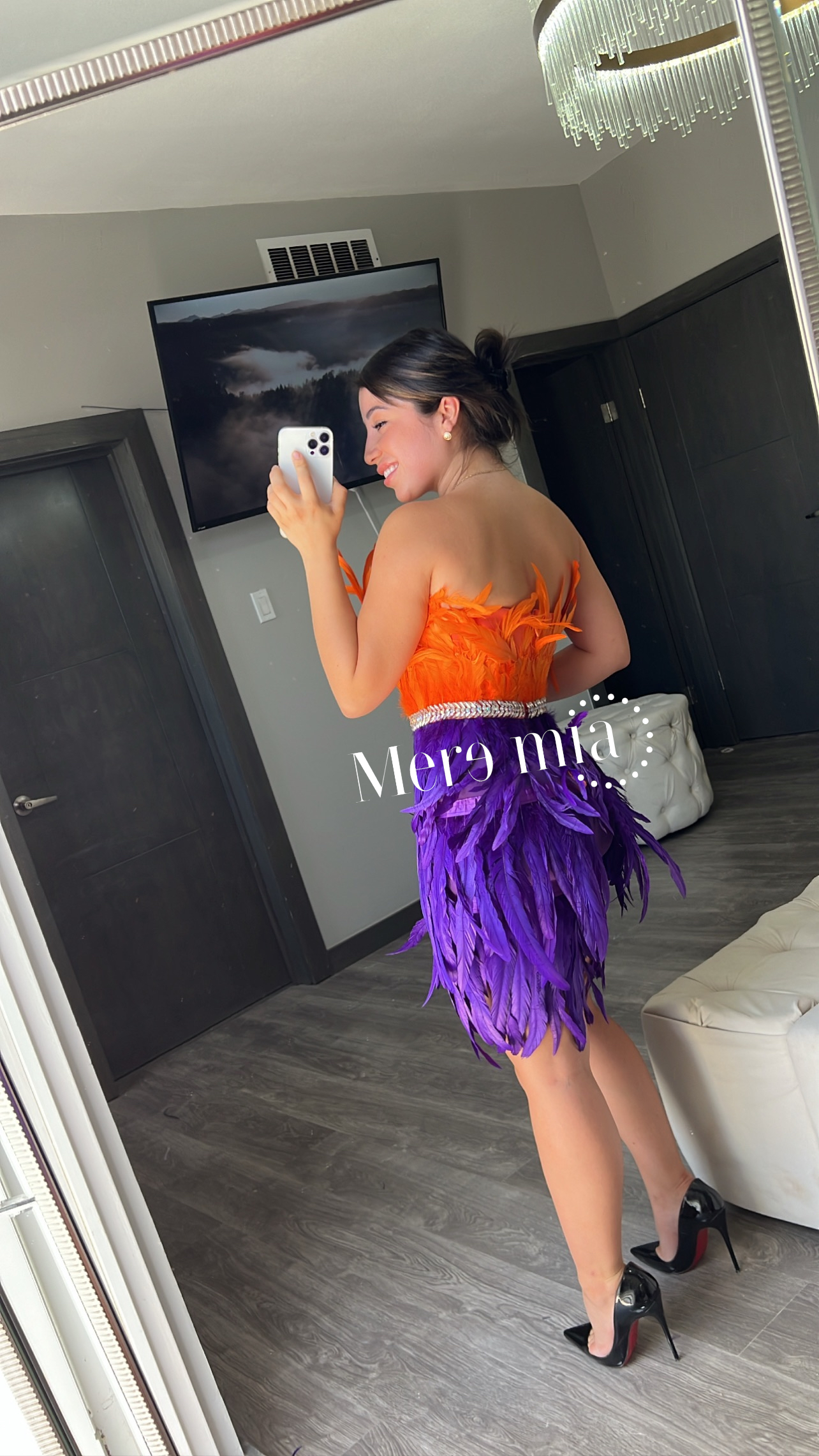 Vestido plumas naranja y morado