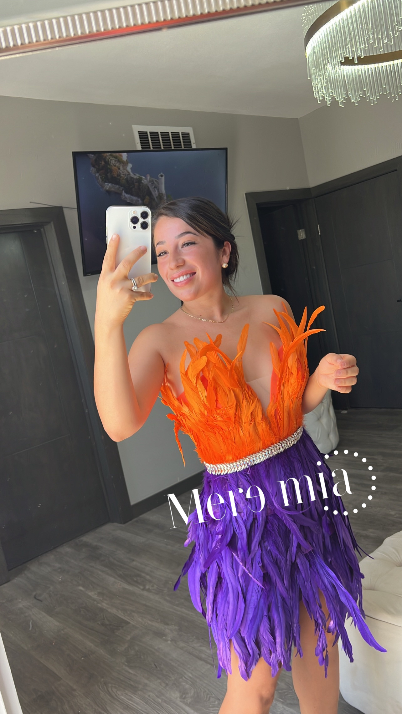 Vestido plumas naranja y morado